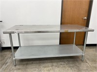 Stainless steel work table.