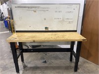 Worktable with built in back panel.