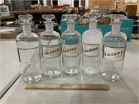 Five Matching Apothecary Bottles