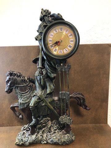Juan Ponce de Leon on horse clock. See details