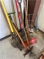 Large Lot of Garden Rakes and Shovels, and Garden