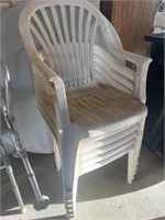 Six Plastic Stackable Patio Chairs