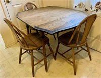 wooden dropleaf table with 3 chairs and
