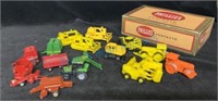 Small plastic and diecast tractors