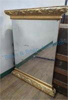 Beveled gold colored mirror