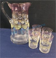 Painted water pitcher and four glasses