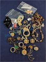 Assortment of jewelry necklaces brooches e