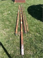 (4) 2” X 2 “- 10 foot iron poles- hooks  on one
