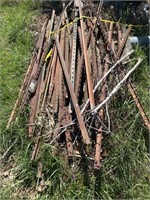 Large lot of t- posts. Some straight some bent.