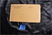 1957 mint 5 coin set still in sealed envelope