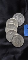 5 silver half dollars