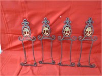 (4)Wrought iron holders.