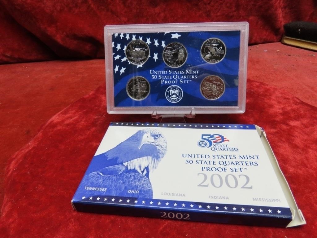 2002 US State Quarters Proof set coins.