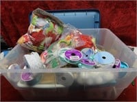 Tote full of crafting supplies. Ribbons, beads,