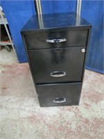 Metal file cabinet.