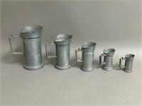 Five Vintage French Pewter Measuring Jugs