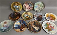 Eleven Decorative Collectible Plates