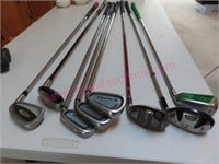 8 Various golf clubs (Titliest-Wilson-Cobra)