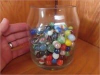 Old glass jar of marbles