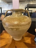 Tan pottery urn