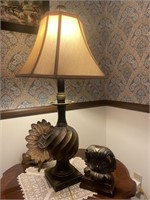 Lamp and table decor with doily