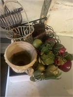 Wire baskets, ceramic vase, decorative fruit