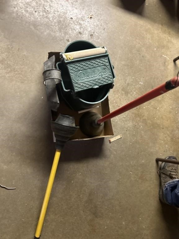 Mop bucket, toilet plungers, and a dustpan