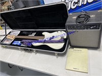 Fender Squier Bass Guitar & Amp
Hard case, 2