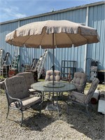 Glass table with 5 chairs/ pads and umbrella