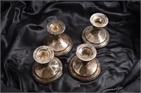 4 sterling candle holders