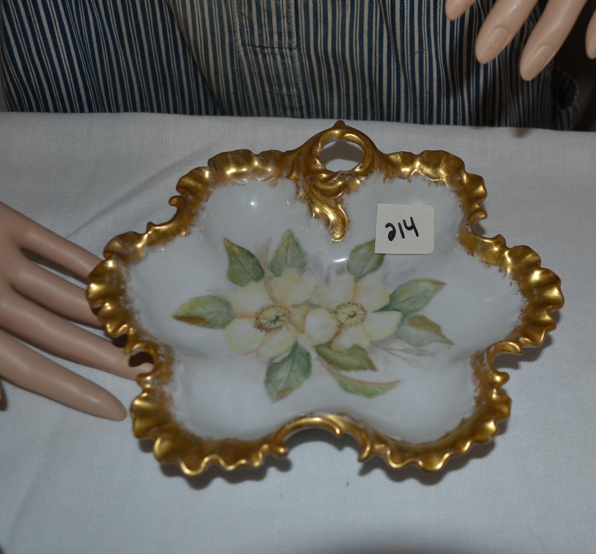 Gold rimmed decorative plate