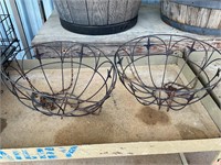 2 wire hanging baskets. One in rough shape
