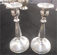 Pair of Prelude sterling weighted candleholders