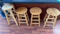 Wooden bar stools 3 at 24 inch tall, 1 at 39 inch