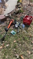 Electric trimmer, gas can, lawn supplies