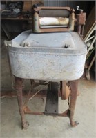 Antique Maytag ringer washer.