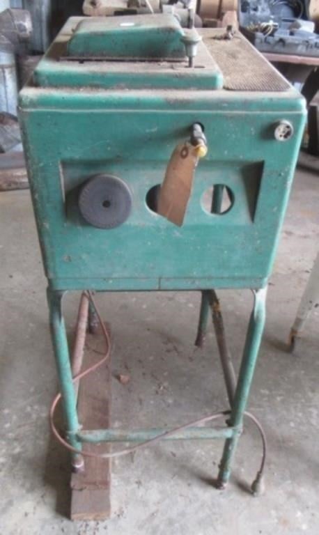 Antique spark plug cleaner.