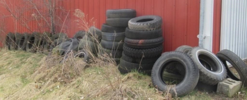 Large assortment of tractor and trailer tires.