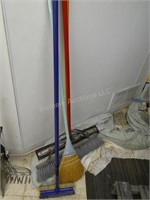 4 brooms, squeegee and mop