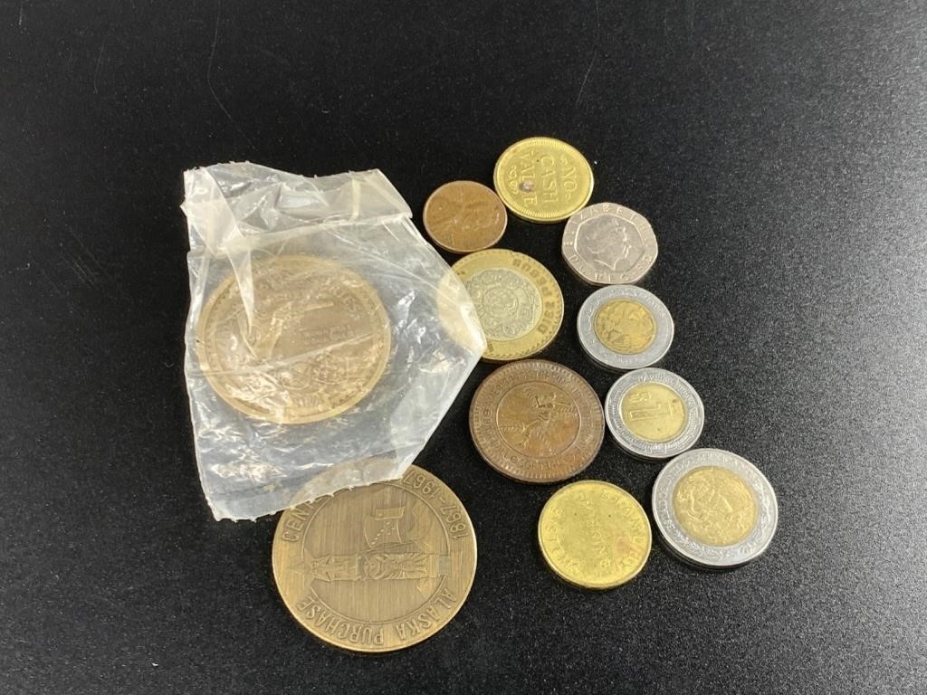 Mixed collection of coins and tokens