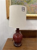 Red pottery lamp
