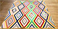 Vintage hand stitched diamond pattern quilt