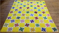 Vintage hand stitched yellow background quilt