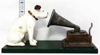 Cast iron dog listening to phonograph