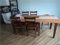 Kitchen Table With Four Chairs As Shown Located
