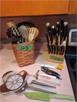 Set Of Kitchen Knives Utensils As Shown Located