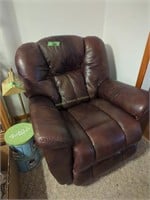 Leather Recliner With Brass Floor Lamp Located At