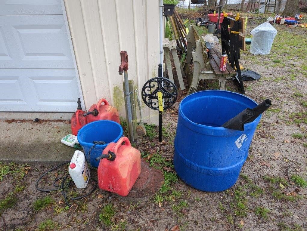 Gas Can Trash Can Hose Holder As Shown Located