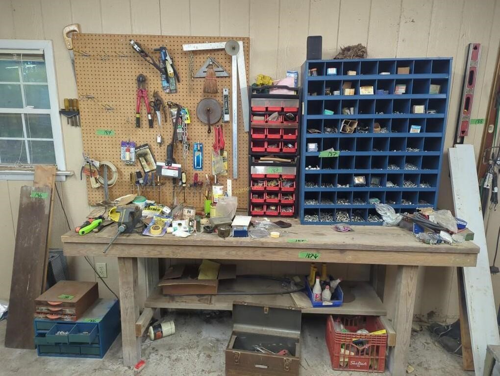 Workbench With Vise Tools On The Wall Bolt