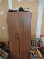 Two-door Storage Cabinet With Hats, Chair Stands